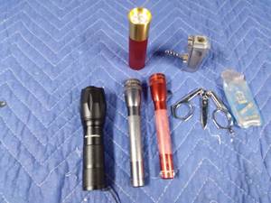 lot 164 image: 4 Flashlights, lighter with corkscrew and folding scissors