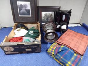 lot 186 image: Advertised caps, coffee pot, blanket and framed pictures