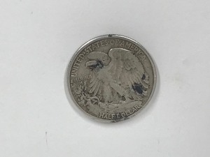 lot 250 image: 1945 Walking Liberty Half Dollar