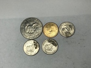 lot 253 image: 1977 Ike One Dollar - 3  1979 Susan B Anthony One dollar Coins & 1  2000 Sacajawea One Dollar Coin