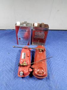 lot 376 image: 2 Coleman fuel gas cans and grill fuel tanks