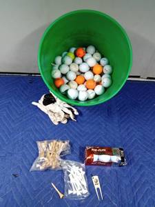 lot 394 image: Pail of golf balls and tees