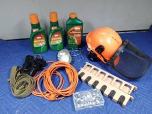 lot 411 image: Chain saw hard hat, 3 bottles of Weed B Gone, trouble light, belts and more
