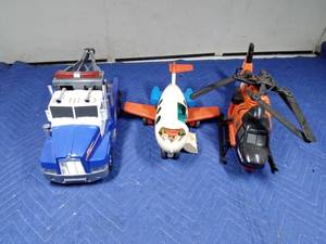 lot 416 image: Tonka tow truck and helicopter and Fisher price airplane