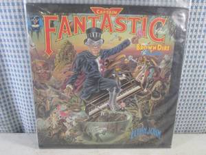 lot 15 image: (FS) 1975 Elton John Captain Fantastic And The Brown Dirt Cowboy Album - Jacket and Record Individually Sleeved and Record On Outside of Jacket