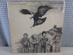 lot 16 image: (FS) 1974 Traffic When The Eagle Flies Album - Jacket and Record Individually Sleeved and Record On Outside of Jacket