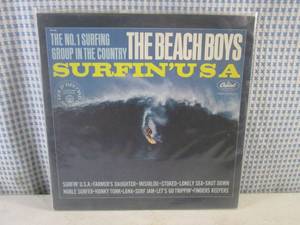 lot 23 image: (FS) The Beach Boys Surfin USA Album - Jacket and Record Individually Sleeved and Record On Outside of Jacket
