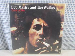 lot 33 image: (FS) 1970 Bob Marley and The Wailers Catch A Fire Album - Jacket and Record Individually Sleeved and Record On Outside of Jacket
