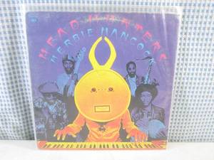 lot 74 image: (FS) 1973 Herbie Hancock Head Hunters Album - Jacket and Record Individually Sleeved and Record On Outside of Jacket
