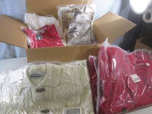 lot 91 image: (G-1) Box Full of Assorted New Clothes - Including Sweaters and a Jacket