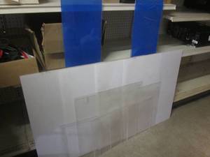 lot 248 image: (CS) Assorted Pieces of Plexiglass  2 - 47 x 10  2 - 31 x 27  1 - 31 x 25 14  1 - 31 x 24  1 - 32 x 23 with Corner Cut Out and Couple other Cuts  4 - 15 x 11 12