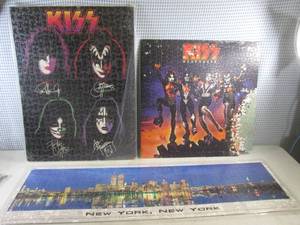 lot 250 image: (FS) 2 Kiss and New York Puzzles - The Four Members and New York Are Laminated - All Have Issues See Photos