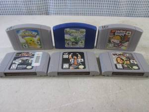 lot 261 image: (BSB) 6 Nintendo 64 Game Cartridges Including Pikachui, Rugrats, Bassmaster, WWF, WCW Etc See Photos