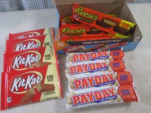 lot 317 image: (C-1) Box of 12 King Size Candy Bars 4 Each of Kit Kat, Pay Day and Reeses Peanut Butter Cups Best by Date Vary March - Aug 2024