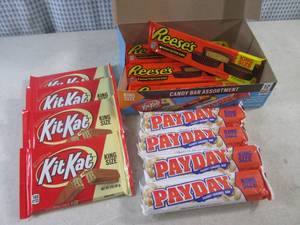 lot 318 image: (C-1) Box of 12 King Size Candy Bars 4 Each of Kit Kat, Pay Day and Reeses Peanut Butter Cups Best by Date Vary March - Aug 2024