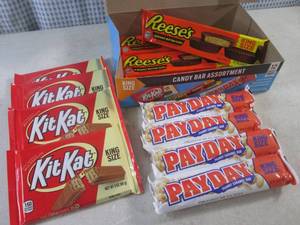 lot 321 image: (C-1) Box of 12 King Size Candy Bars 4 Each of Kit Kat, Pay Day and Reeses Peanut Butter Cups Best by Date Vary March - Aug 2024
