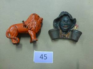 Vintage cast iron lion bank and match holder