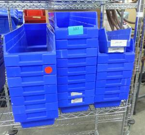 Group of 23 storage bins