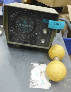 Lowrance fish finder and a float