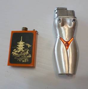 2 Vintage lighters, the bikini one has light up boobs and crotch, the other has a strike down the side