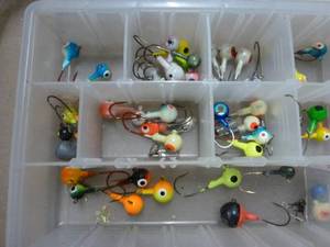 plano box with lots of new jig heads