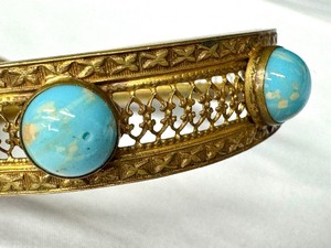 lot 342 image: Vintage Gold Tone Bangle with Turquoise Style Cabochons
