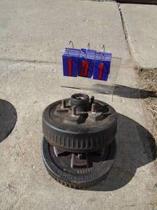 Qty of 2 9 trailer brake drums & hubs. 5 stud. Used condition. As shown.