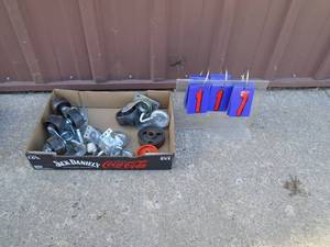Flat of casters. As shown.