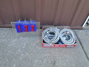 Flat of stainless water hoses. As shown.