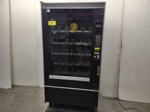 lot 13 image: Crane Model 167 Commercial Vending Machine