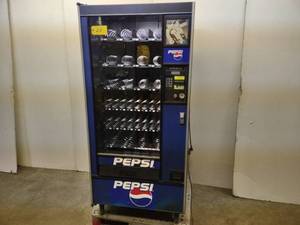 lot 22 image: Automatic Products Model Snack Shop 122B Commercial Vending Machine