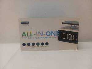 lot 30 image: NEW WIRELESS CHARGING SMART ALARM CLOCK