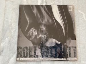 lot 233 image: Roll with It by Steve Winwood Vinyl LP Record Album.