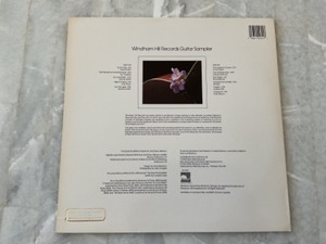 lot 241 image: Windham Hill Records Guitar Sampler Vinyl LP Record Album.