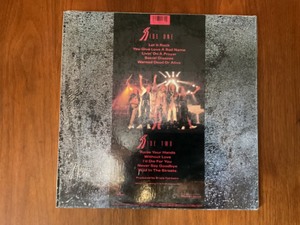 lot 251 image: Vintage 1986 Mercury Records BON JOVI Slippery When Wet, vinyl LP Record Album.