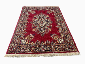lot 7 image: Vintage Red Machine Made Rug 91 X 67