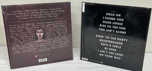 Alabama Shakes Boys and Girls Record Album and John Mellencamp Sad Clowns and Hillbillies Record Album