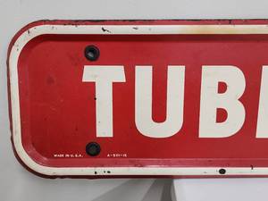lot 42 image: Vintage One Sided Tubeless Tire Metal Sign
