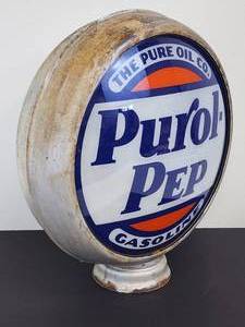 lot 27 image: Vintage Double-Sided Glass Purol-Pep Gasoline Gas Pump Globe