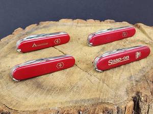 lot 149 image: (4) Assorted Swiss Utility Pocketknives