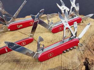 lot 244 image: (4) Assorted Vintage Swiss Utility Pocket Knives