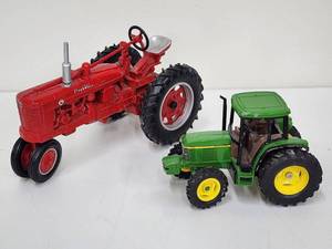 lot 320 image: (2) Assorted Toy Tractors