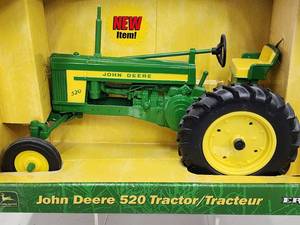 lot 323 image: John Deere 520 Tractor NIB