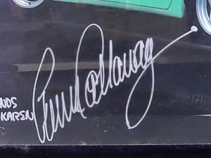 lot 400 image: Framed Poster of the Callaway Corvette Autographed by Reves Callaway