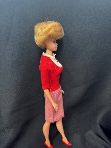 lot 22 image: Vintage Bubblecut Barbie Wearing Student Teacher Outfit