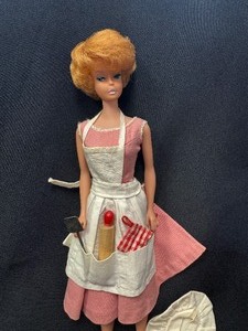 lot 23 image: Vintage Bubblecut Barbie Wearing Barbie-Q Outfit