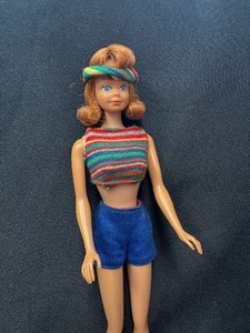 lot 24 image: Vintage Midge Doll Wearing Shorts and Top with Headband