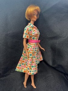 lot 35 image: Vintage Barbie Wearing Barbie Print Dress