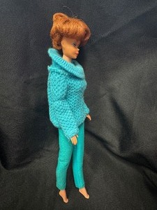 lot 40 image: Vintage Bubblecut Barbie Wearing Photo Fashion Outfit