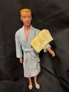 lot 46 image: Ken Doll with Blonde Molded Hair Wearing Bathrobe with Towel
